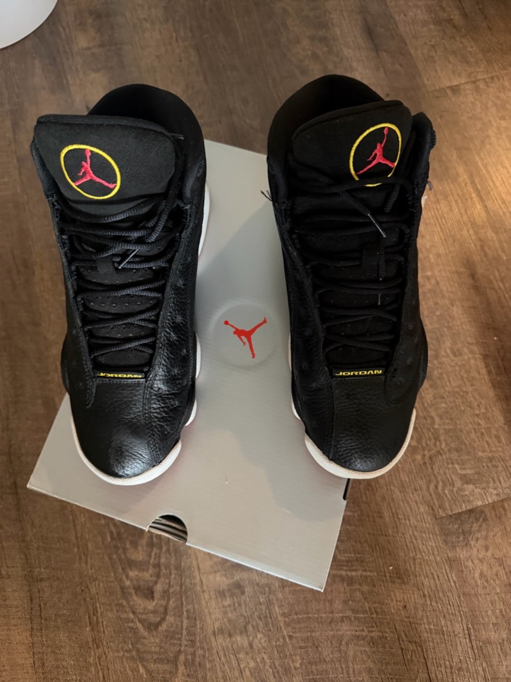 Jordan Men’s Black with Red & Yellow Jumpman High-Top Sneakers